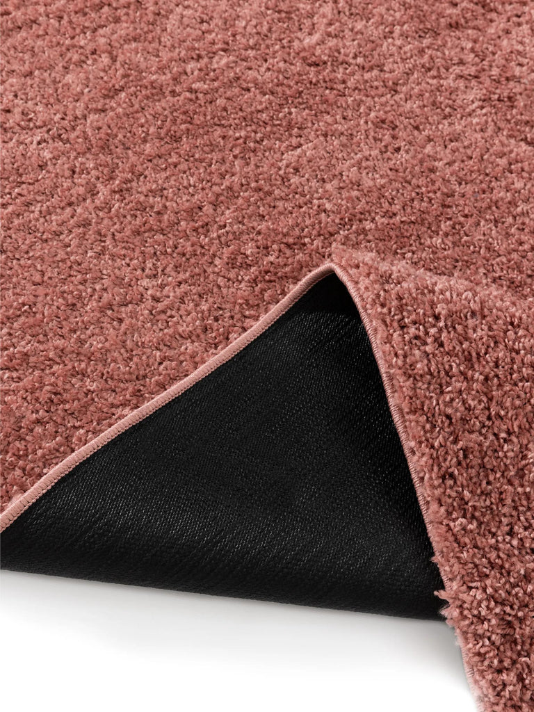 Tapis moderne uni poils longs frisés rose lavable 120x170 cm
