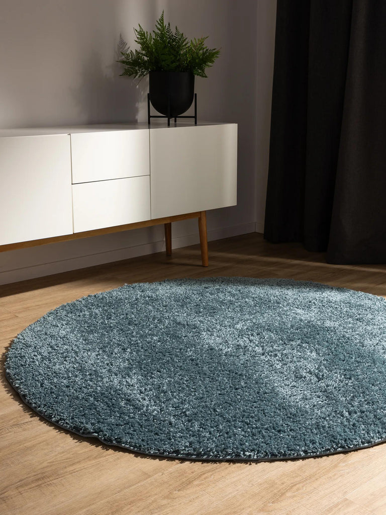 Tapis moderne uni poils longs frisés rond bleu pétrole lavable 160 cm de diamètre