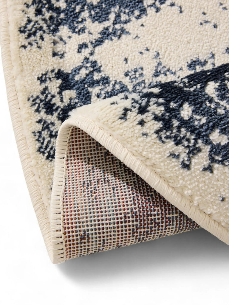 Tapis vintage oriental rond beige et bleu 120 cm de diamètre