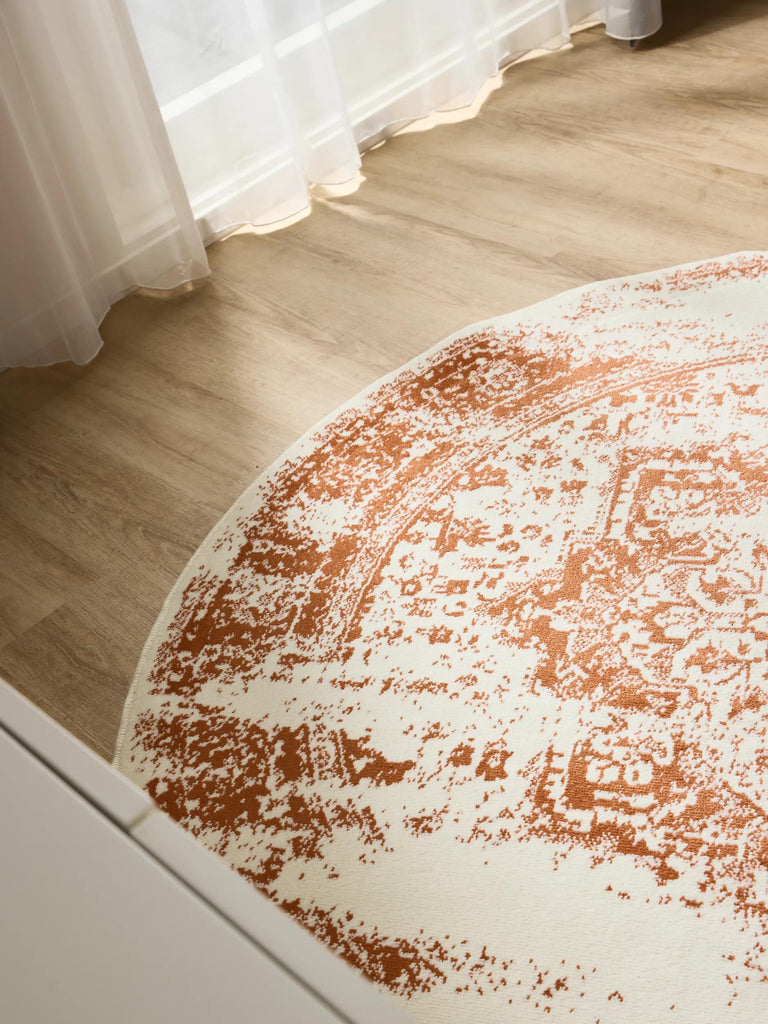 Tapis vintage oriental rond beige et terracotta 120 cm de diamètre