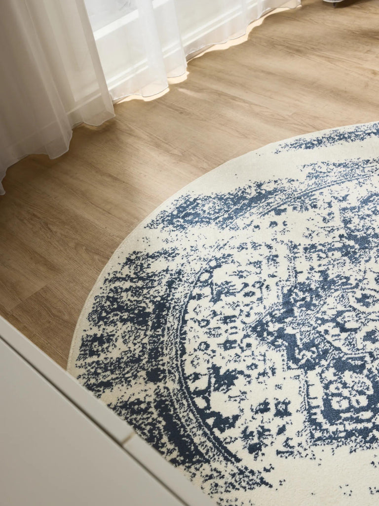 Tapis vintage oriental rond beige et bleu 120 cm de diamètre