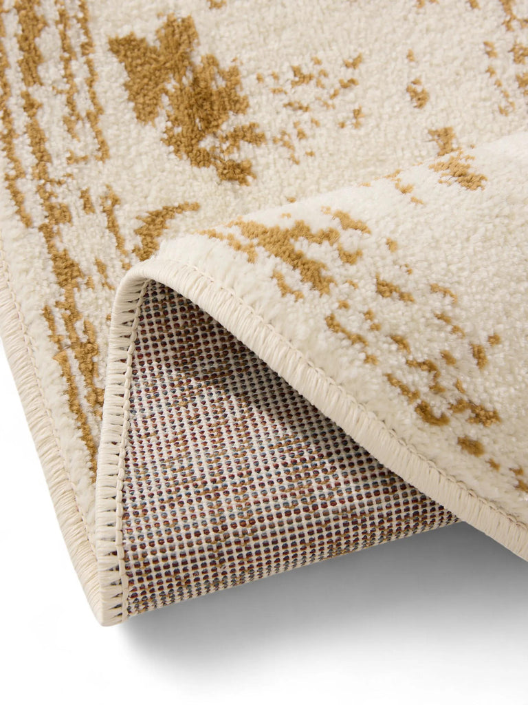 Tapis vintage motif floral rond beige et camel 120 cm de diamètre