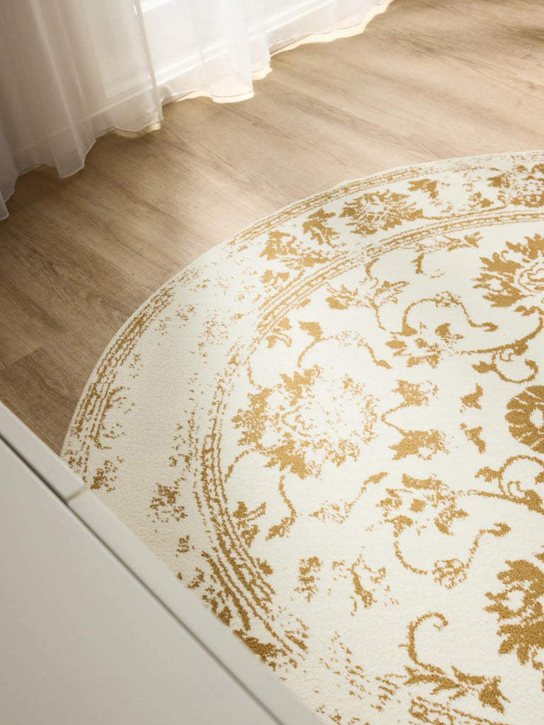 Tapis vintage motif floral rond beige et camel 120 cm de diamètre