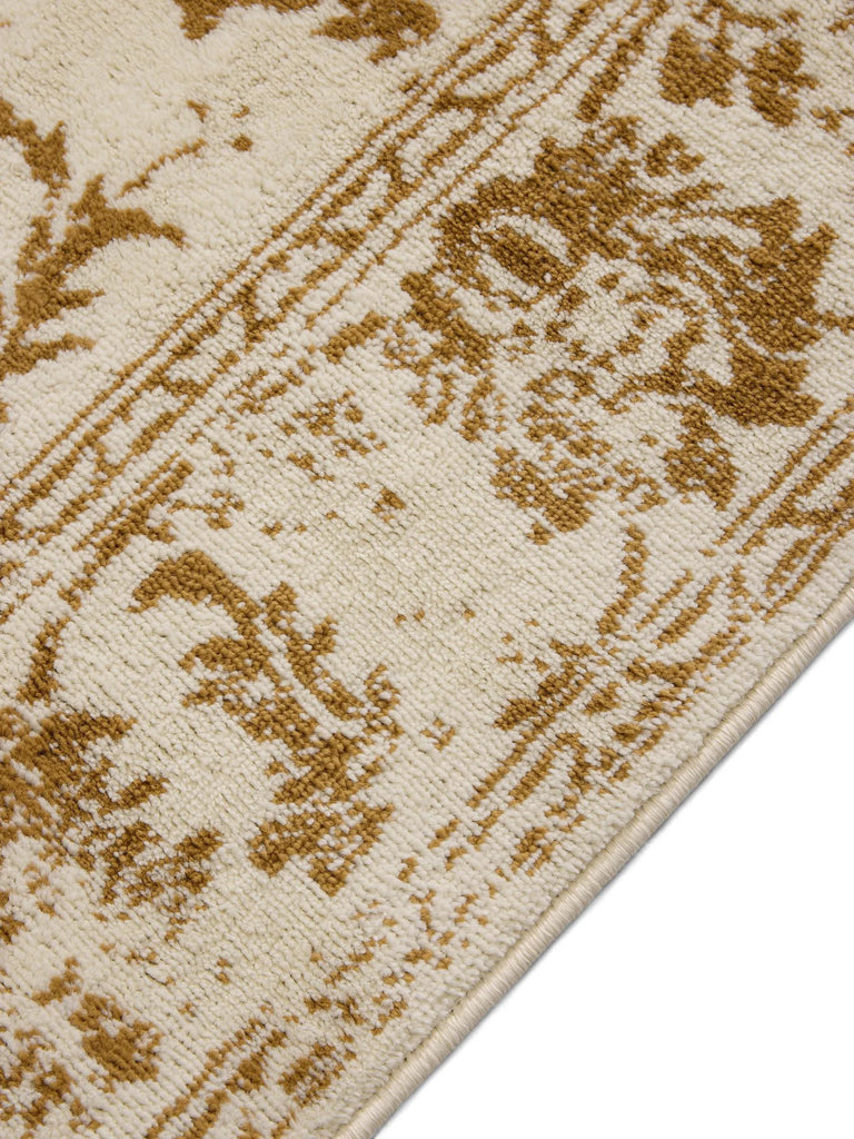 Tapis vintage motif floral beige et camel 60x120 cm