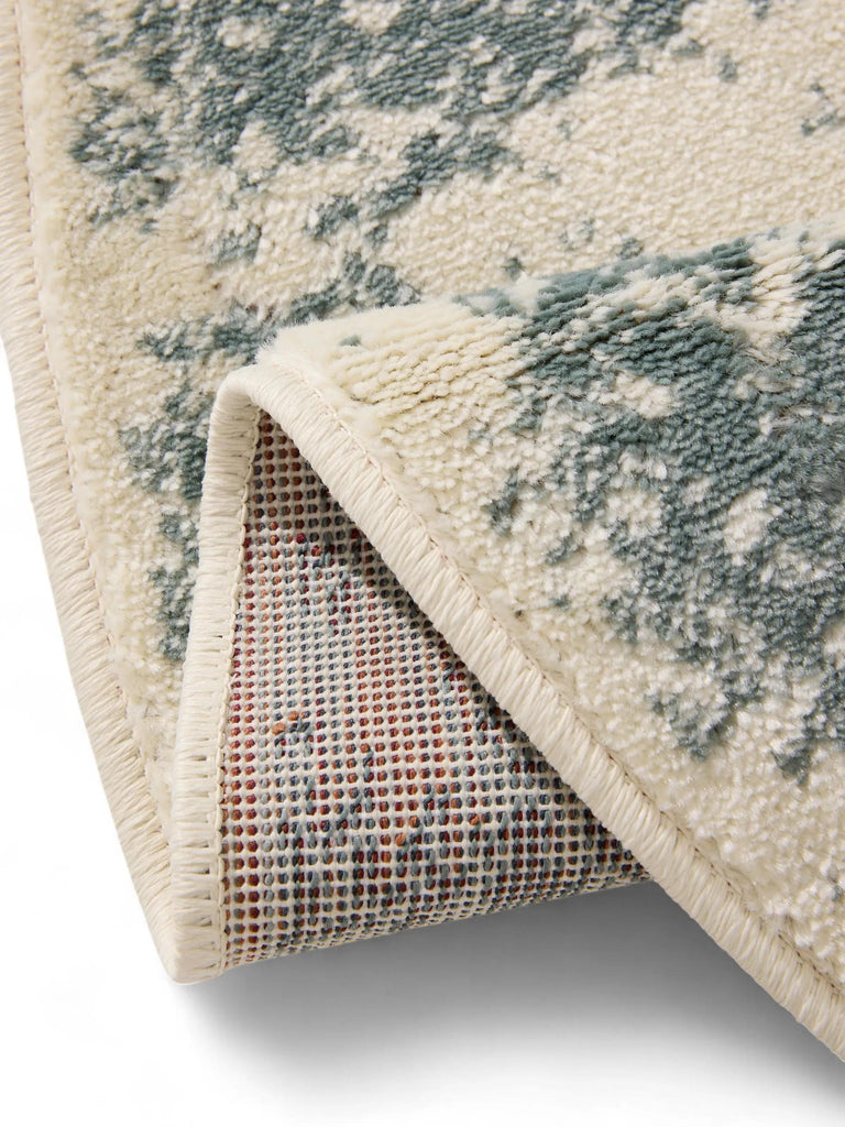 Tapis vintage oriental rond beige et vert 160 cm de diamètre