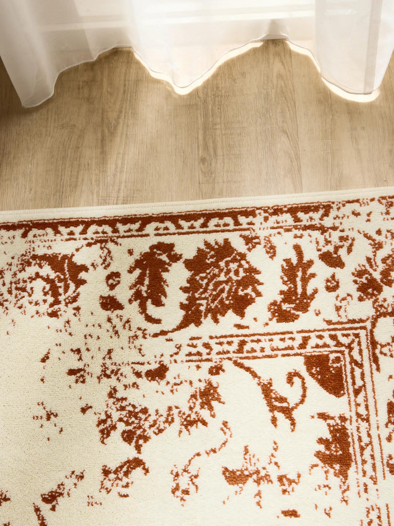 Tapis vintage motif floral crème et terracotta 160x230 cm