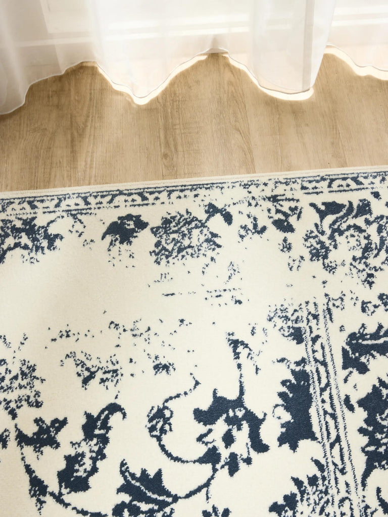 Tapis vintage motif floral beige et bleu 80x150 cm