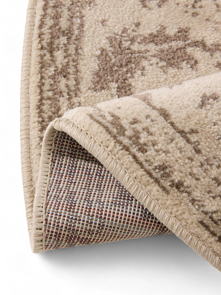 Tapis vintage motif floral rond crème et marron 160 cm de diamètre