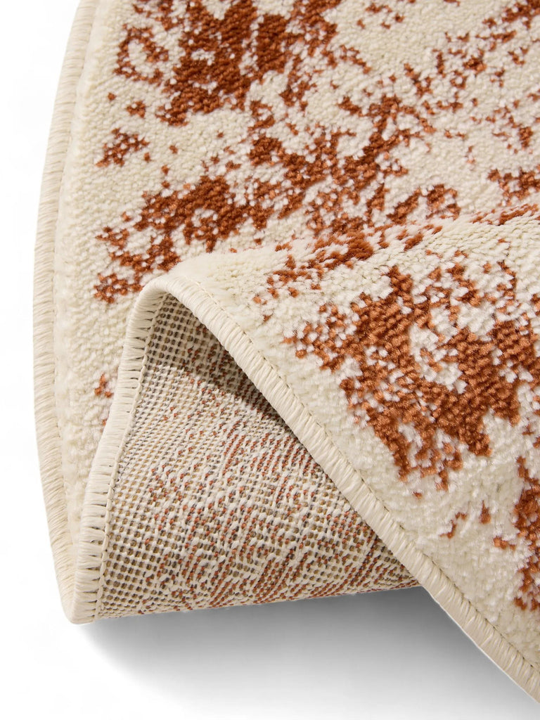 Tapis vintage oriental rond beige et terracotta 160 cm de diamètre