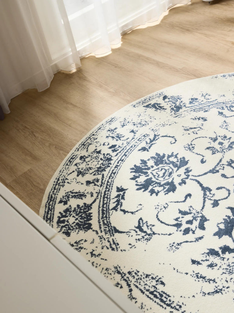 Tapis vintage motif floral rond beige et bleu 120 cm de diamètre