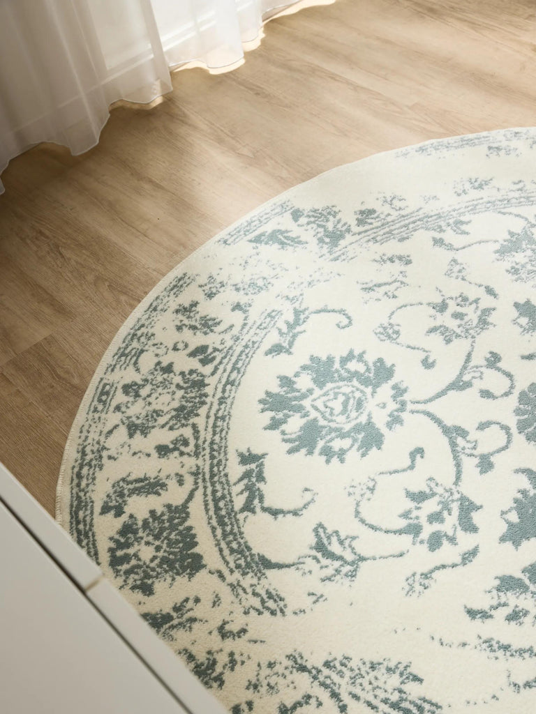 Tapis vintage motif floral rond beige et vert 120 cm de diamètre