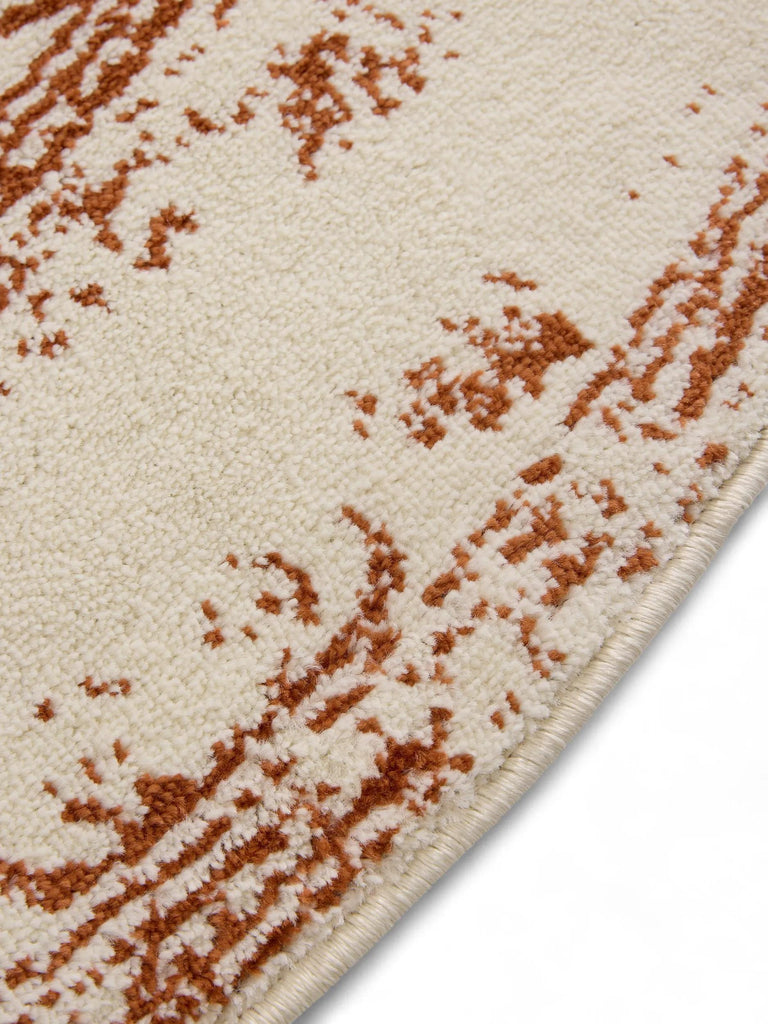 Tapis vintage motif floral rond crème et terracotta 120 cm de diamètre