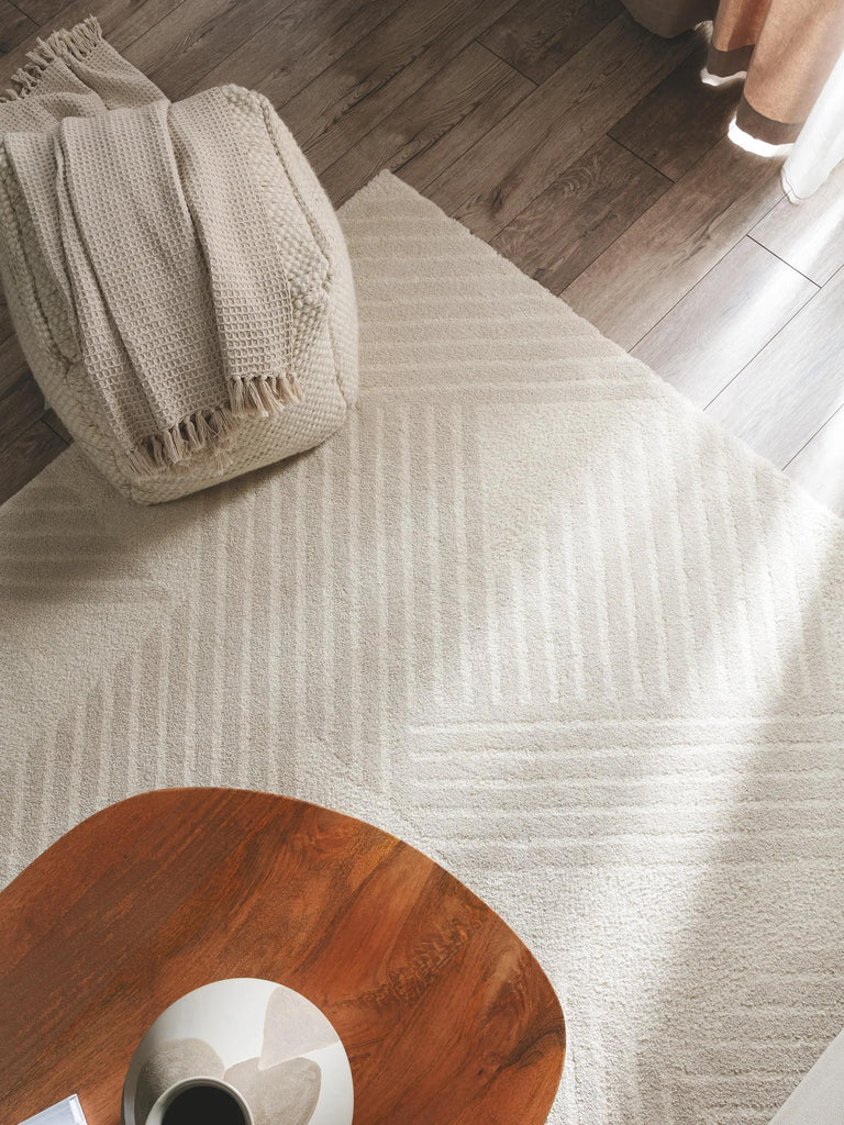 Tapis géométrique motif triangle crème 120x170 cm