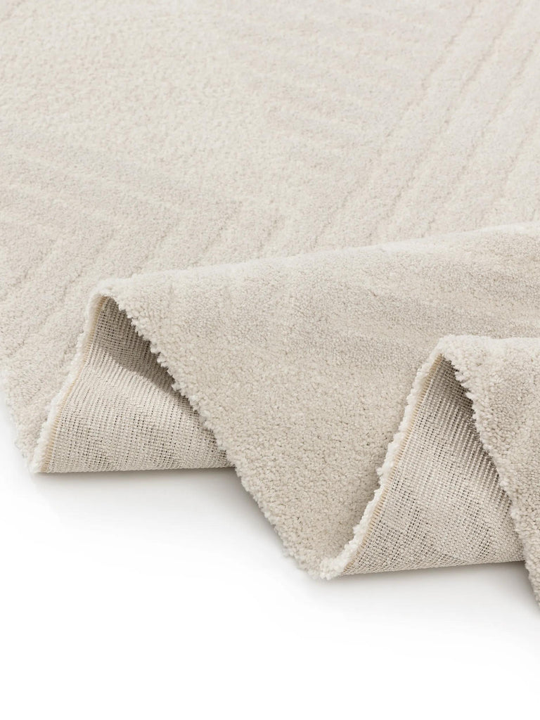 Tapis géométrique motif triangle crème 120x170 cm