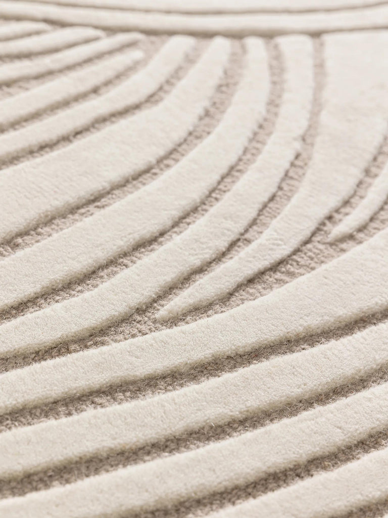 Tapis design motif vague crème et taupe en laine 200x300 cm