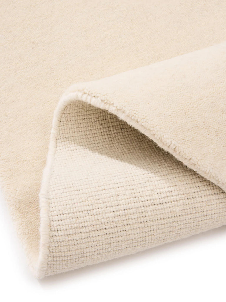 Tapis scandinave uni rond crème en laine 160 cm de diamètre