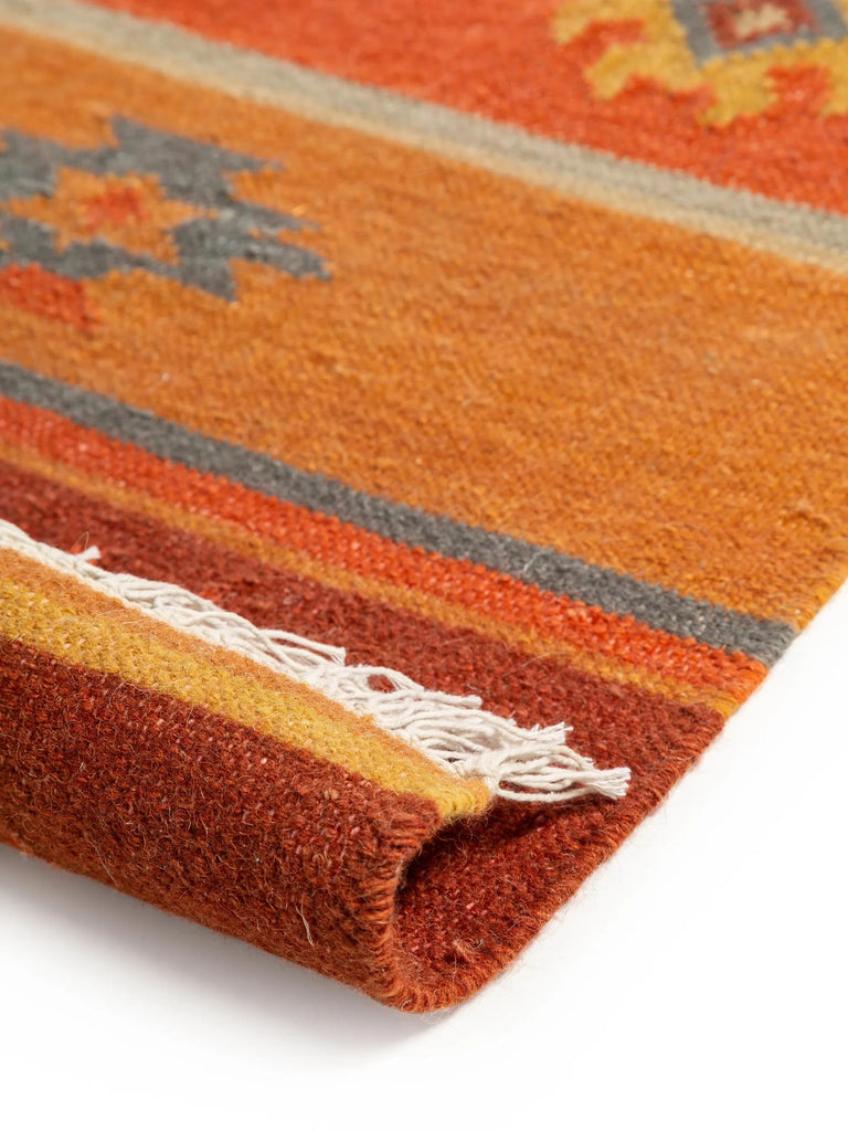 Tapis kilim motif ethnique tons orange multicolore en laine 160x230 cm