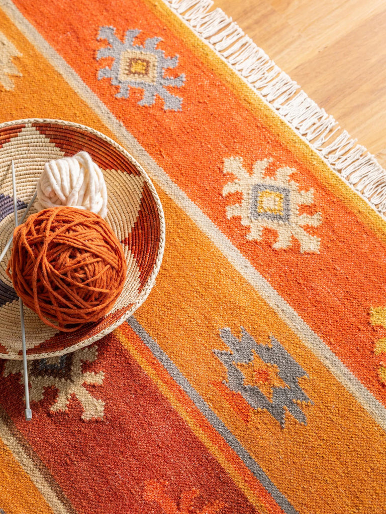 Tapis kilim motif ethnique tons orange multicolore en laine 120x170 cm