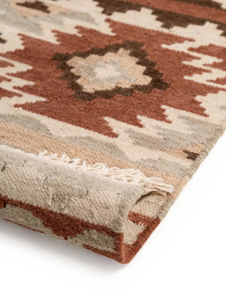 Tapis kilim motif ethnique tons marron multicolore en laine 120x170 cm